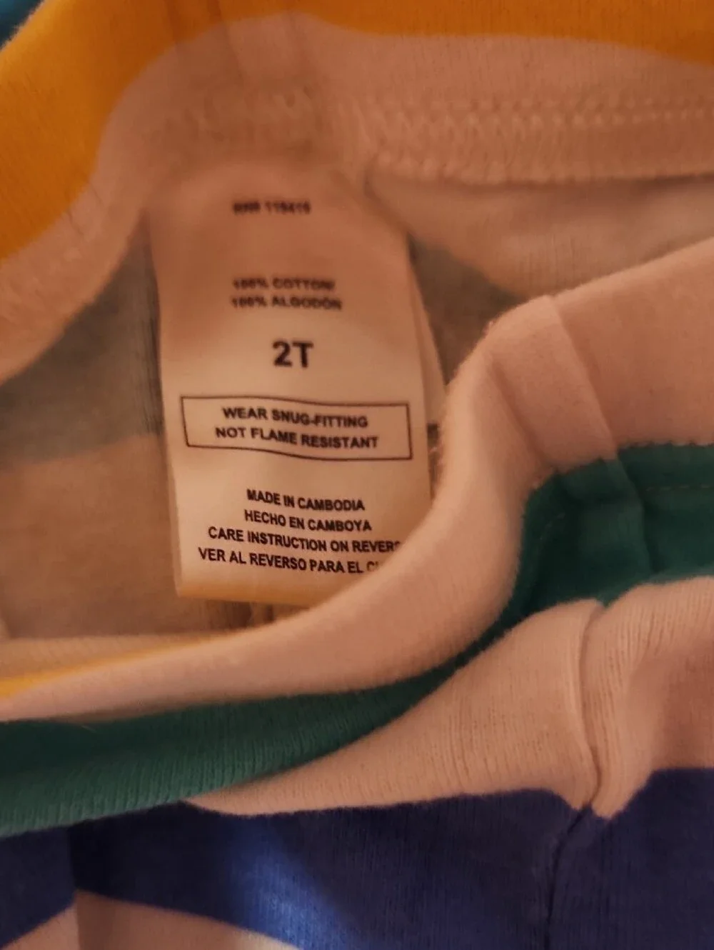 Girls' White Pajama Set with Colorful Stripes and Character Graphic